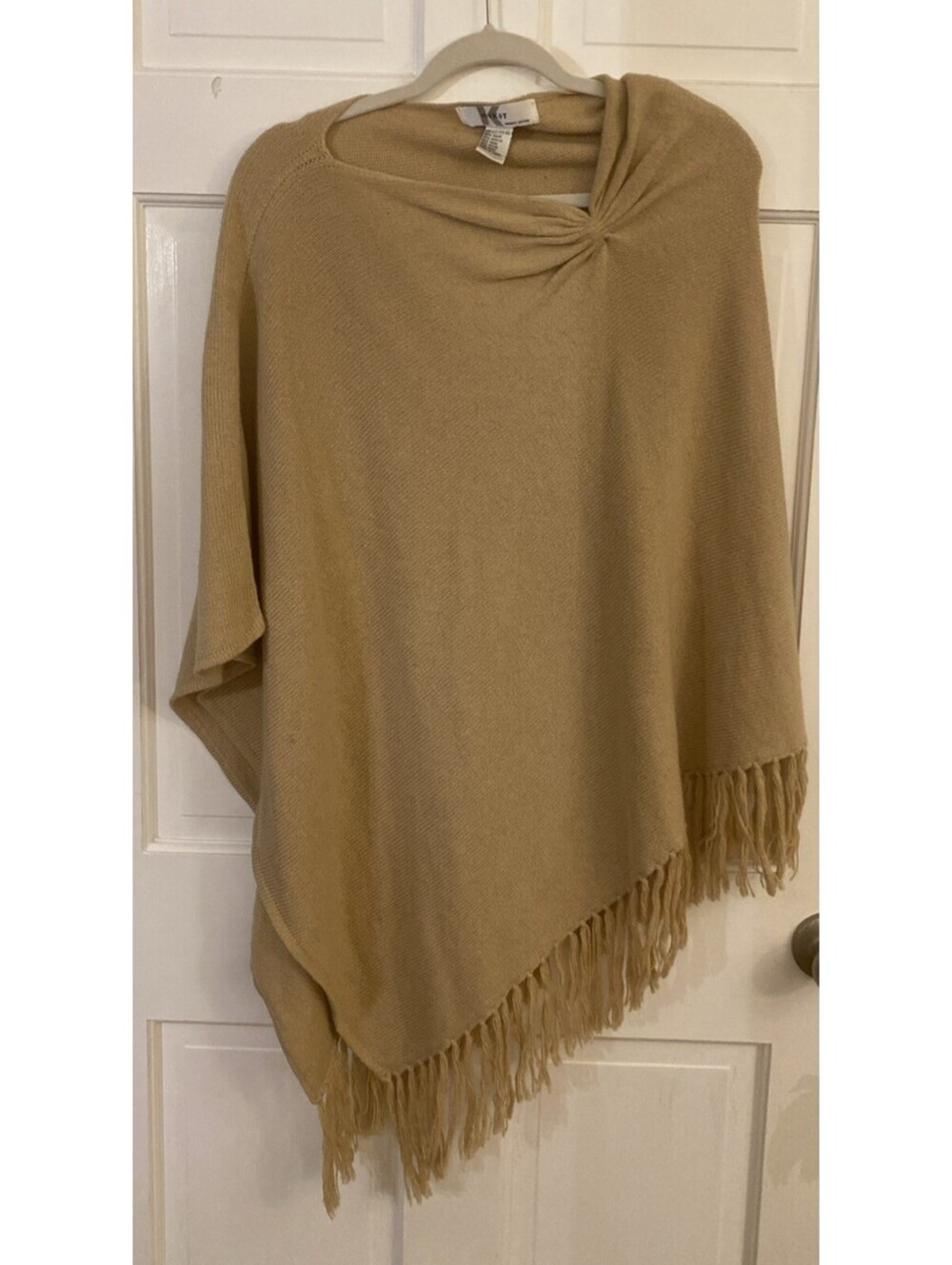 Camel Colored Knit Poncho with Twisted Shoulder And Fringe